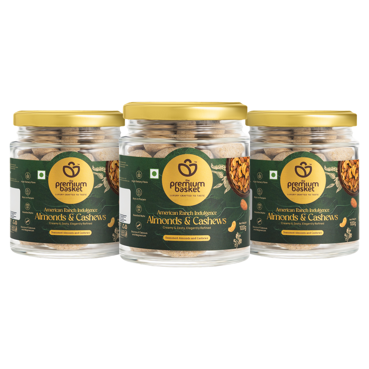 Set of three almonds and cashews snack jars with gold lids and green labels