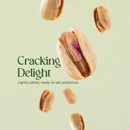 Lightly salted pistachios, kernels and halved nuts falling in the air