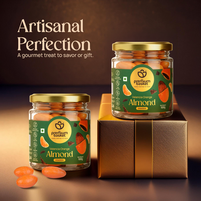Valencia Orange Almond jars with gold lids stacked on a gift box