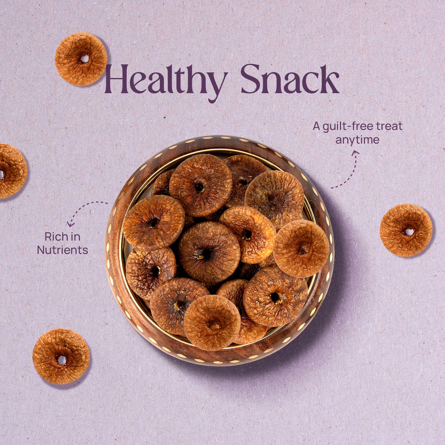 Dried anjeer rounds in a glass bowl, whole dried figs snack
