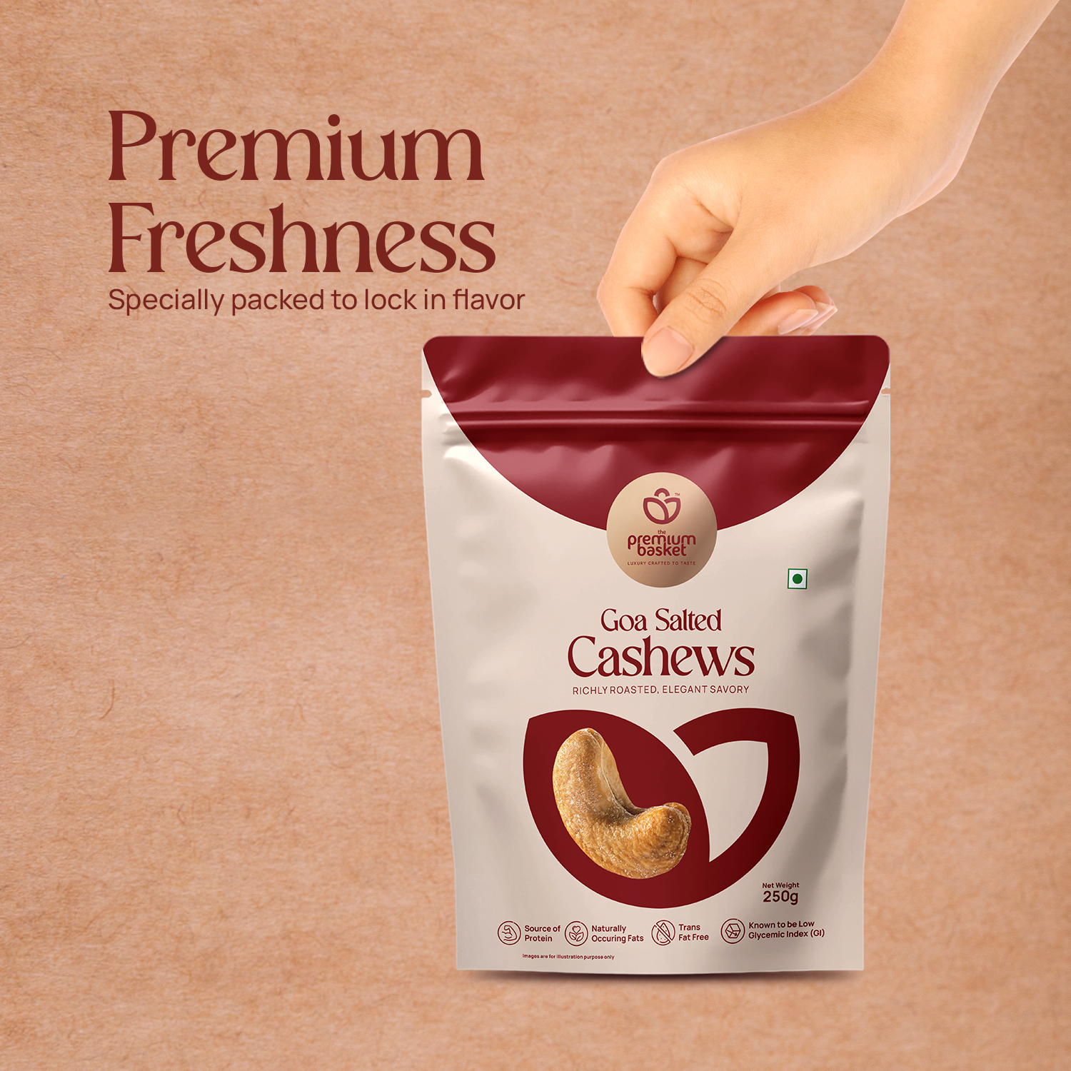 Hand holding a Goan salted cashews pouch on a textured background