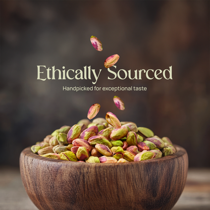 Pistachio kernels in a wooden bowl with nuts floating above