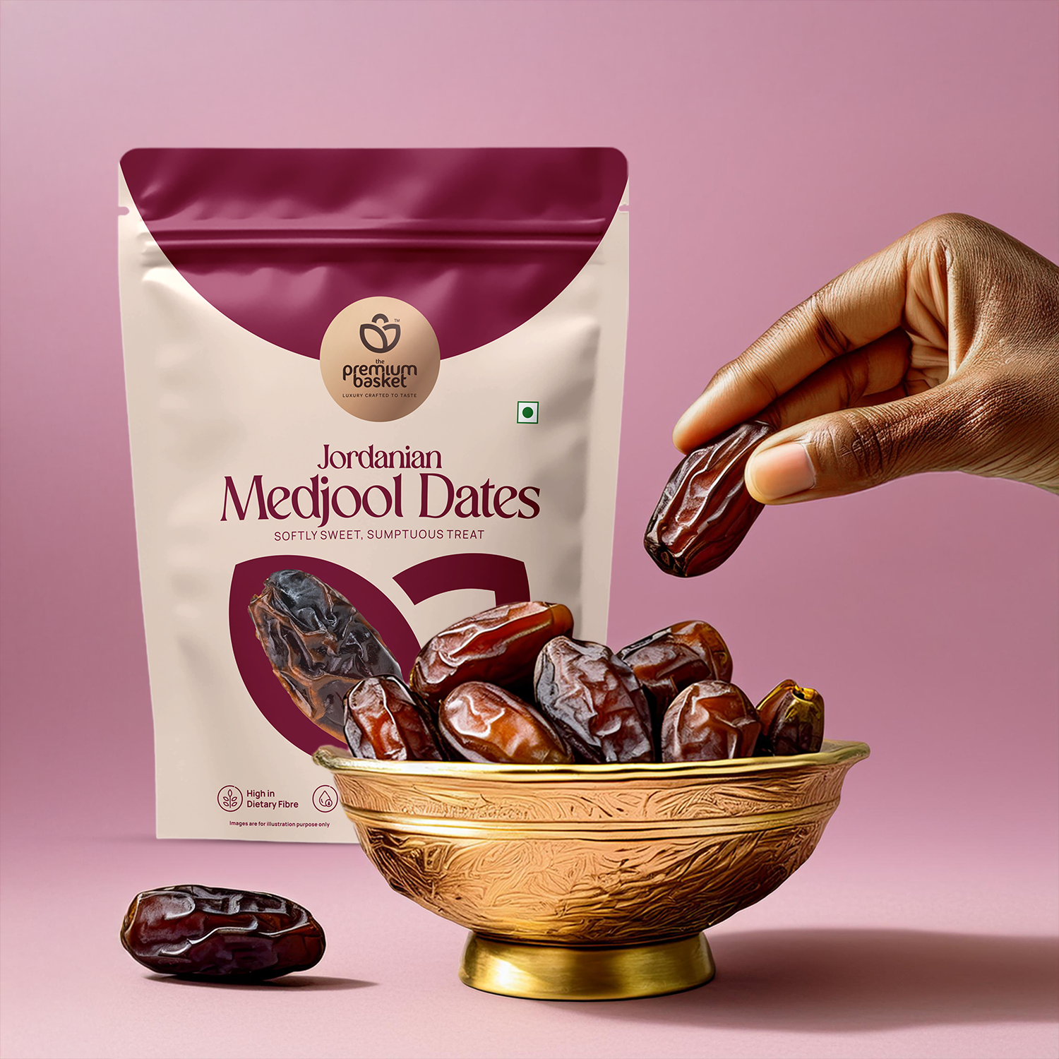 Maroon-and-white date pouch with bowl of dark dates and one date held