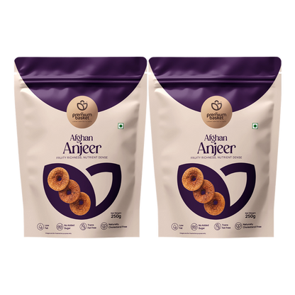 Two Afghan Anjeer pouches with purple seal tops and beige bodies, 250g each