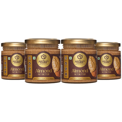 Almond nut butter jars, amber glass with gold lids and brown label, four-pack view