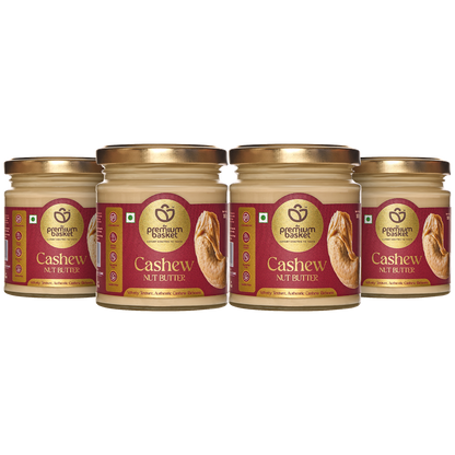 Cashew nut butter jars with gold lids and Premium Baskett labels