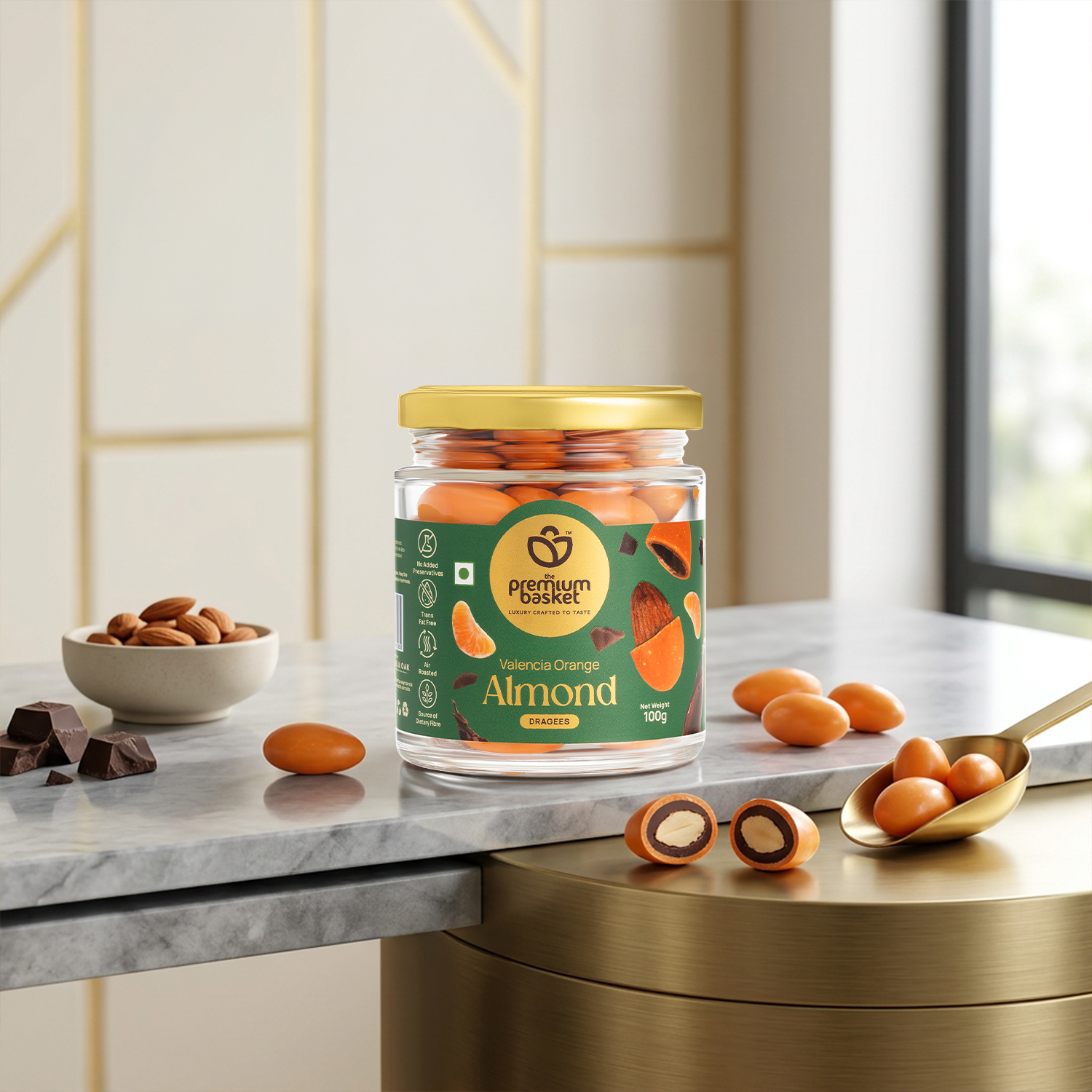 Valencia Orange Almond jar with gold lid surrounded by orange almonds