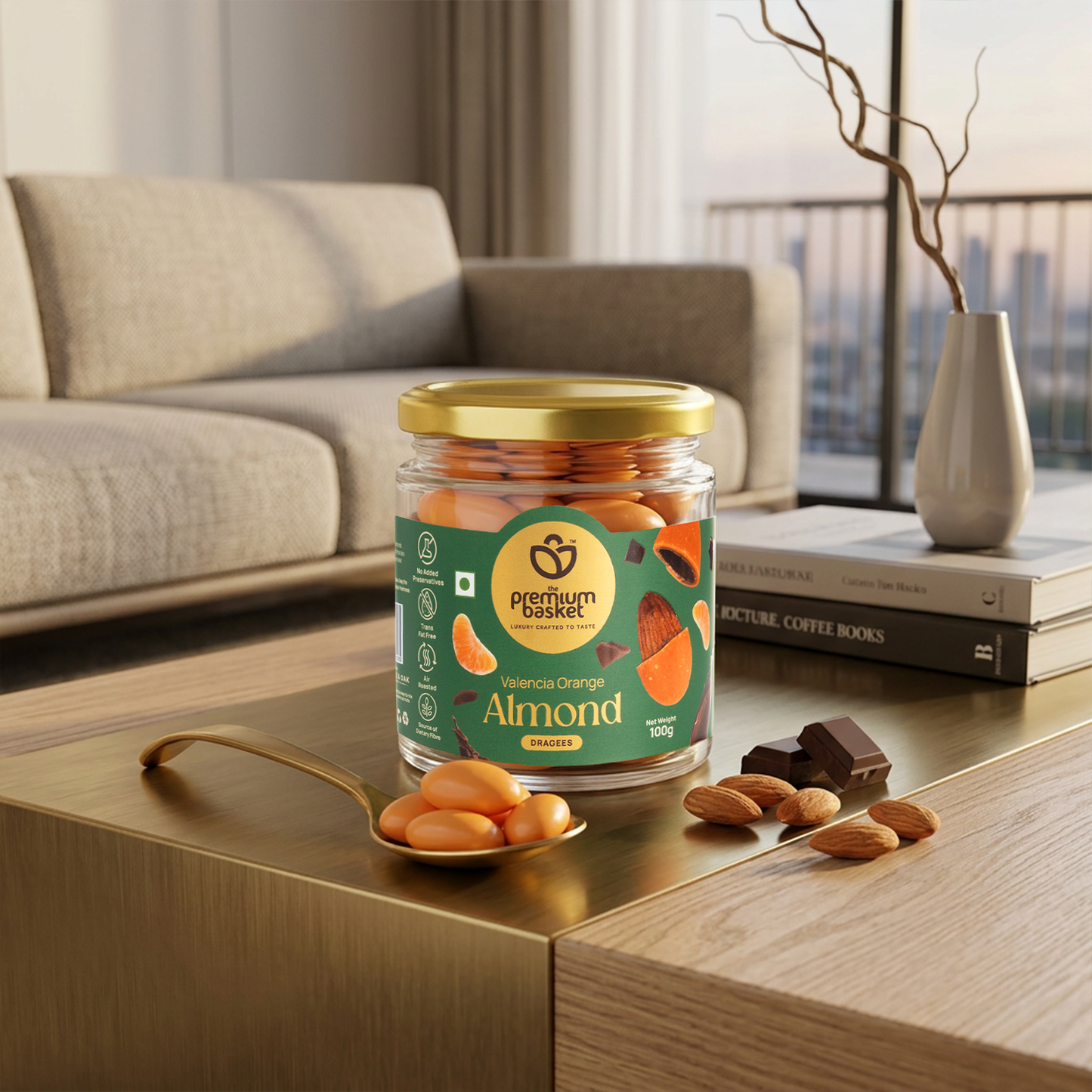 Valencia Orange Almond jar with gold lid and almonds on a wooden countertop