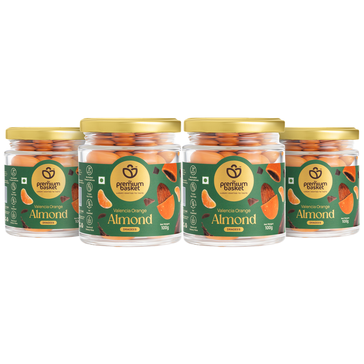 Four glass jars of orange-flavored almond snacks with gold lids and green labels